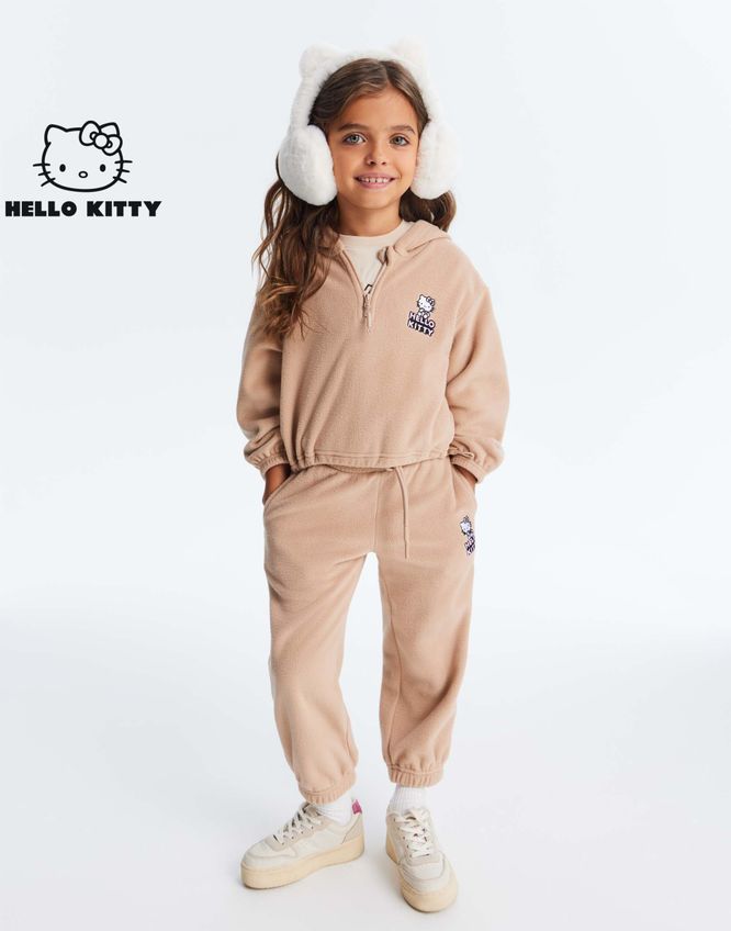 Бежевые спортивные брюки Baggy с вышивкой Hello Kitty для девочки Gloria Jeans